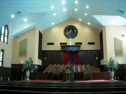 Recordings of gospel singing and MLK Jr's sermons play inside the historic church sanctuary.